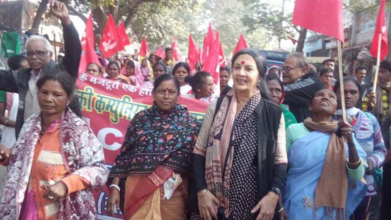 Brinda Karat leading the March in connection with the CPI M district conference in Jamtara