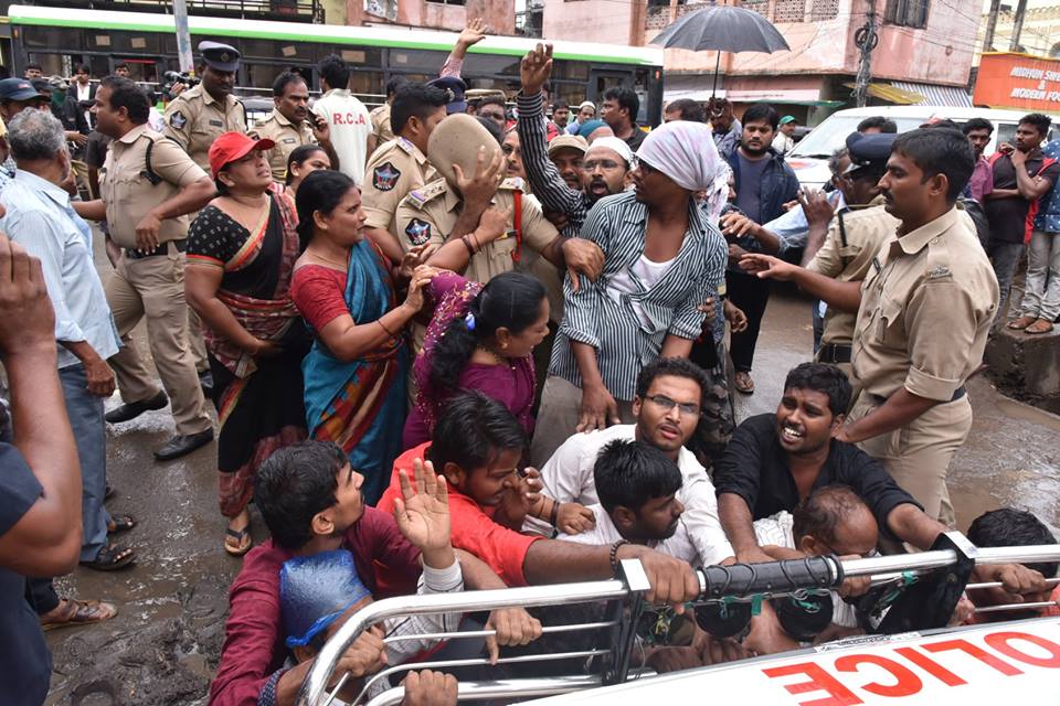 CPI(M) activists protesting against the illegal arrest of young men from minority community in Guntur